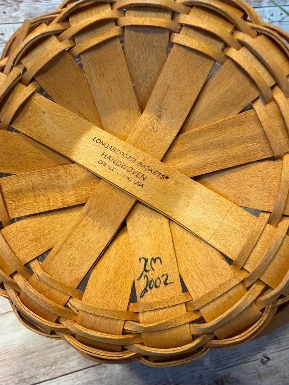 Longaberger woven basket in warm brown with handle